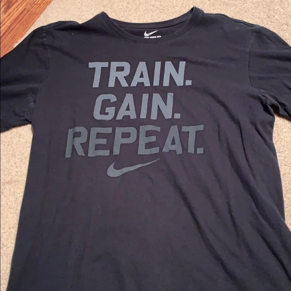 Black nike T-shirt.